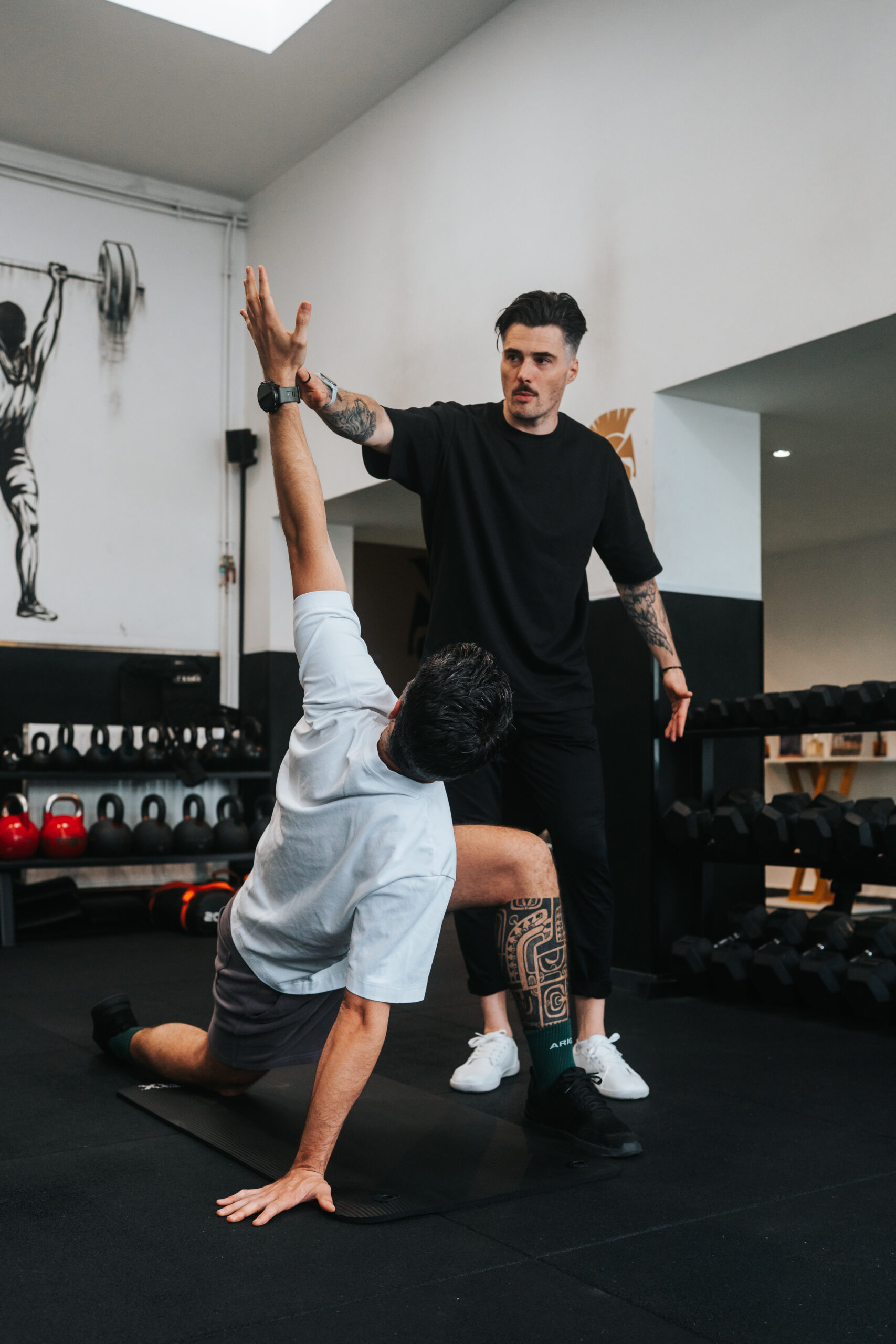 Max qui corrige une posture à un coaché